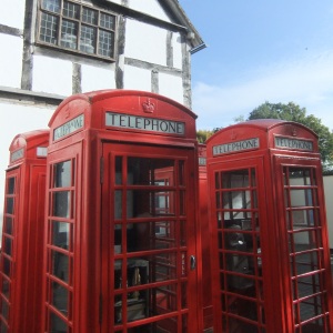 Four red telephone boxes